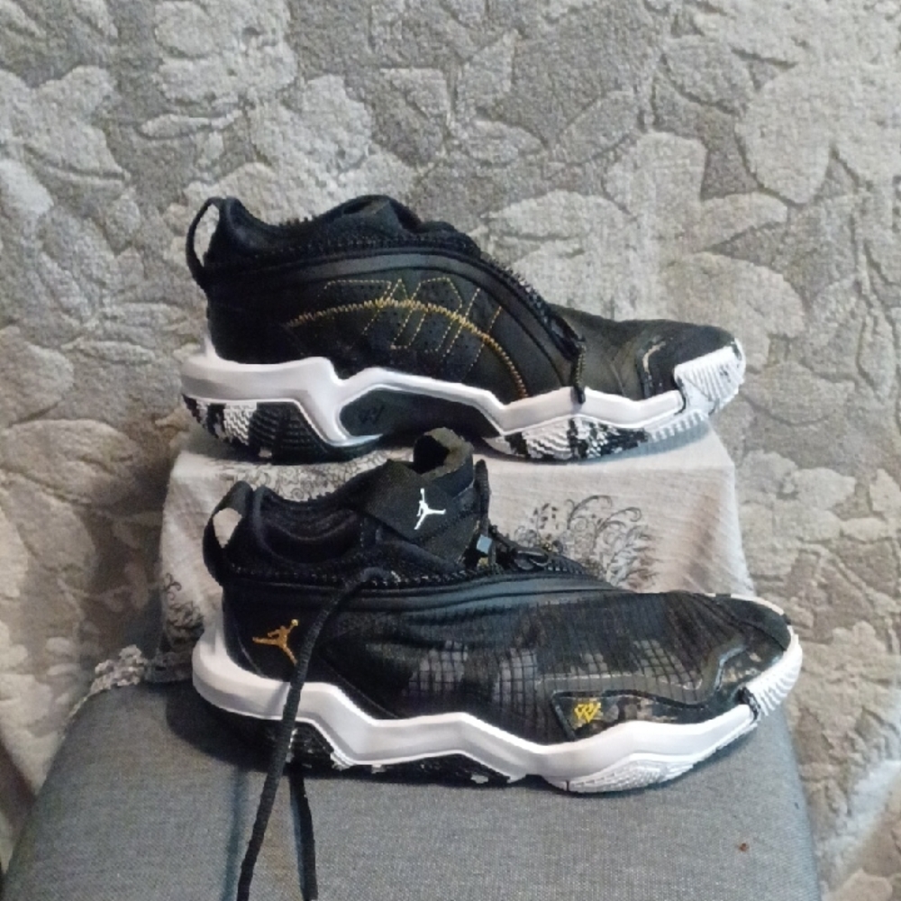 JORDAN Shoes Black and White Athletic Sneakers with Gold Accents